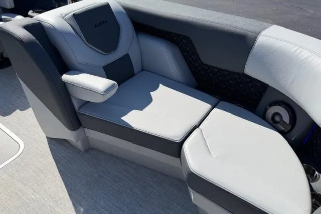 Slide: The Image of Luxurious seating in the 2026 Alera M 23Q boat, featuring sleek gray upholstery. - 42