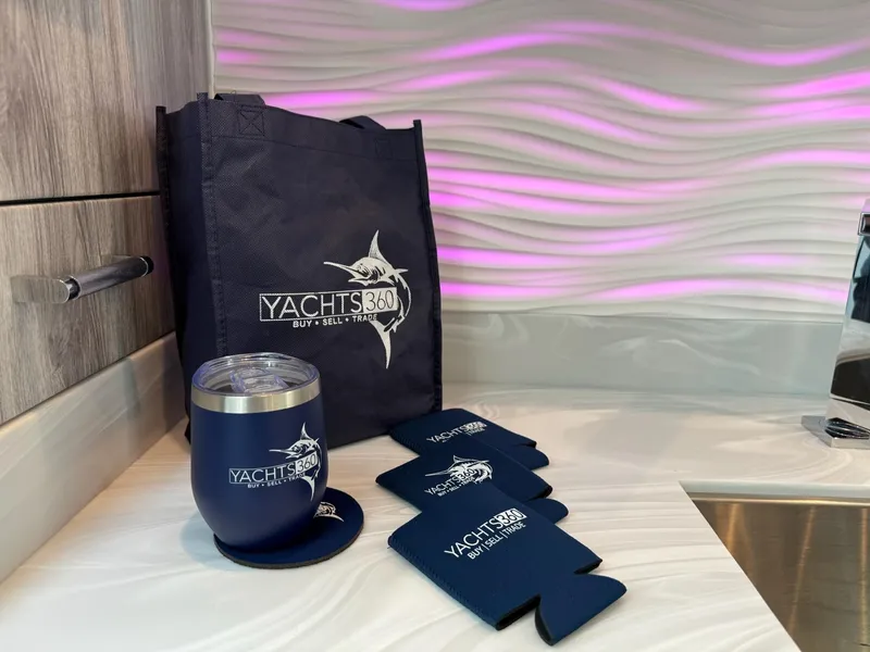 Slide: The Image of Yachts360 branded merchandise on a 2023 Formula 500 Super Sport Crossover yacht interior. - 26