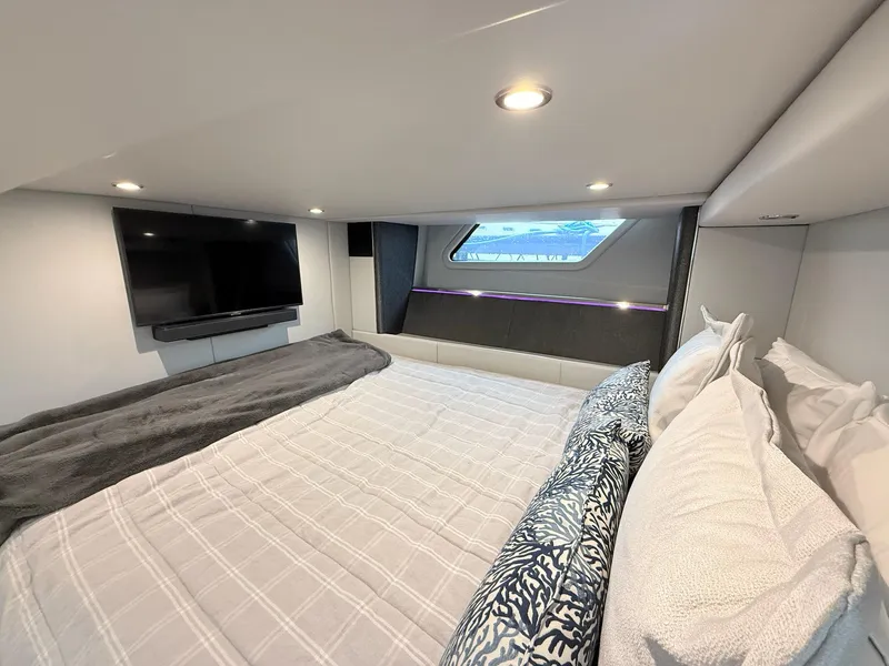 Slide: The Image of Luxurious cabin interior of 2023 Formula 500 Super Sport Crossover with TV and window view. - 30