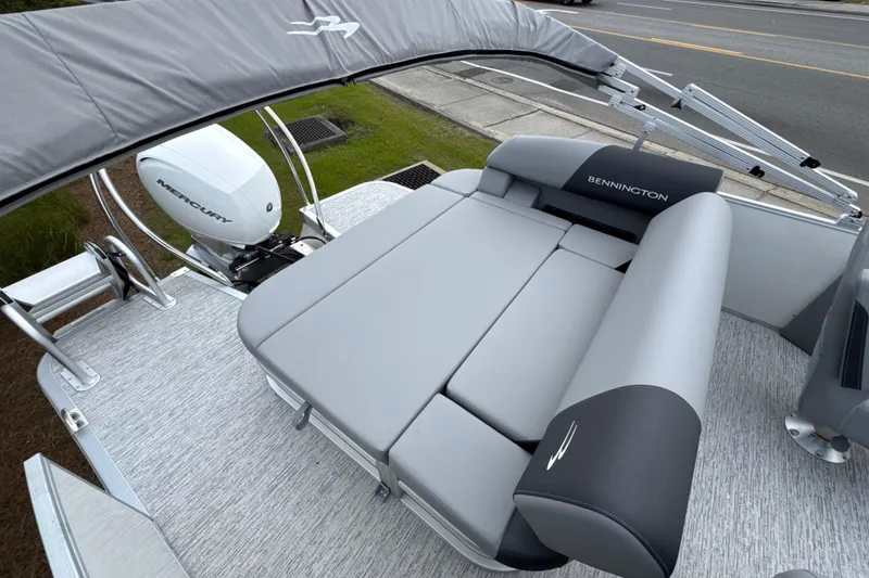 Slide: The Image of 2026 Bennington 22 SSB pontoon boat with Mercury engine and comfortable seating. - 13