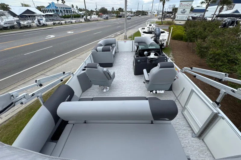 Slide: The Image of 2026 Bennington 22 SSB pontoon boat with spacious seating and modern design on display. - 17