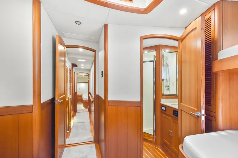 Slide: The Image of Luxurious interior of 2023 Fleming 85 yacht with wooden finishes and modern amenities. - 16