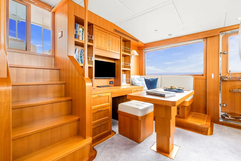 Slide: The Image of Luxurious interior of 2023 Fleming 85 yacht with wooden finishes and modern amenities. - 35
