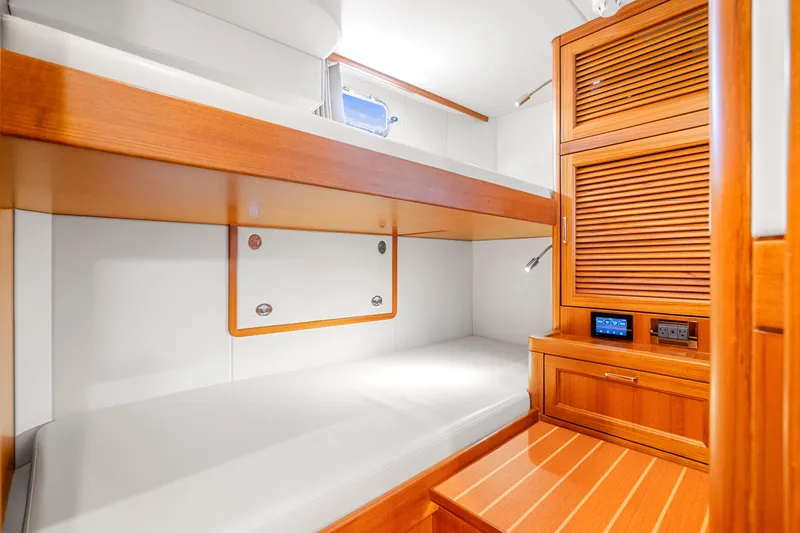 Slide: The Image of Luxurious cabin interior of 2023 Fleming 85 yacht with wooden finishes and modern amenities. - 67