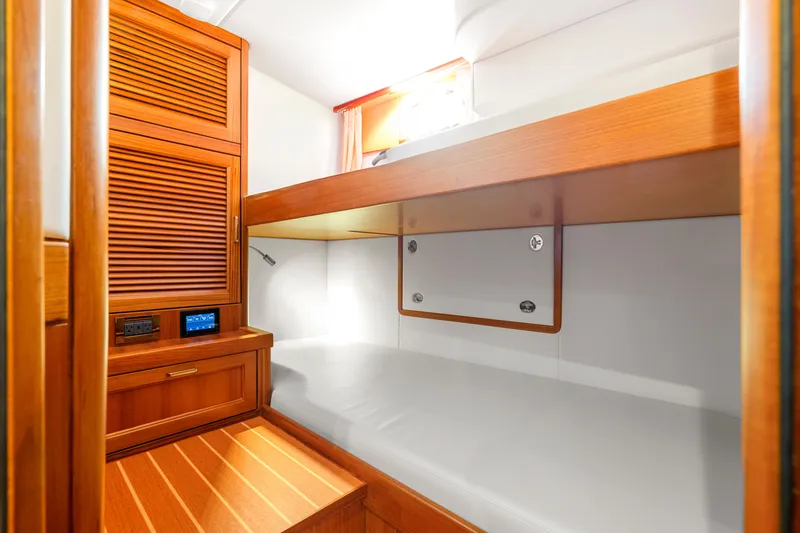Slide: The Image of Luxurious cabin interior of 2023 Fleming 85 yacht with wooden furnishings. - 68
