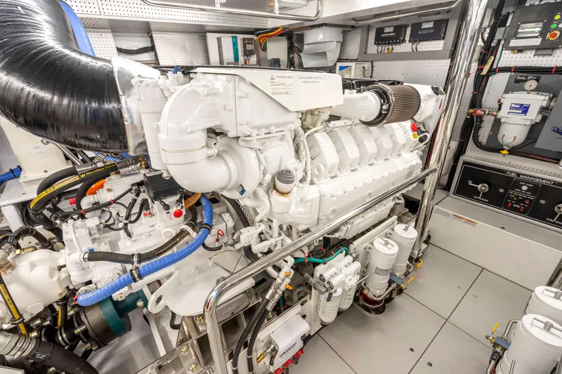 Slide: The Image of Engine room of a 2023 Fleming 85 yacht, showcasing advanced machinery and components. - 75