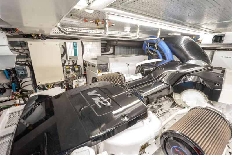 Slide: The Image of Engine room of 2023 Fleming 85 yacht with V12 engine and advanced equipment. - 76