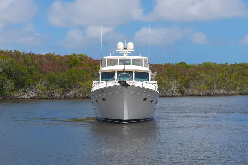 Slide: The Image of Luxury Fleming 85 yacht cruising on a serene river, 2023 model. - 81