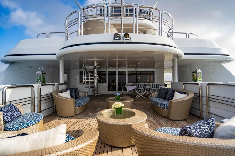 Slide: The Image of Luxurious deck of 2005 New Zealand Yachts 115 Wave Piercer with elegant seating and decor. - 15