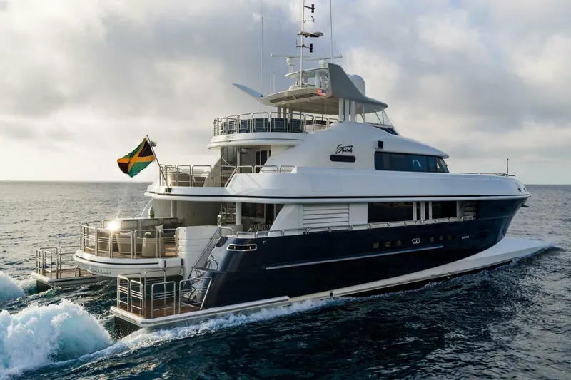 Slide: The Image of Luxury 2005 New Zealand Yachts 115 Wave Piercer cruising on open sea. - 2