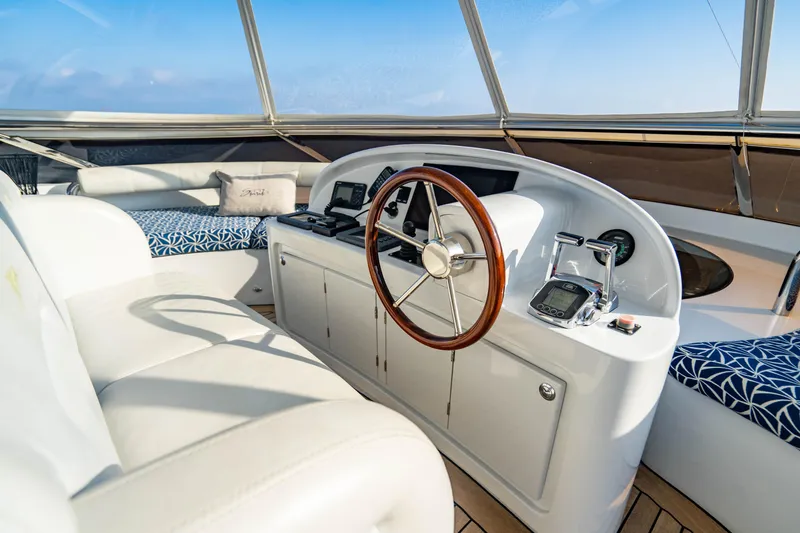 Slide: The Image of Luxurious helm of 2005 New Zealand Yachts 115 Wave Piercer with modern controls and seating. - 22
