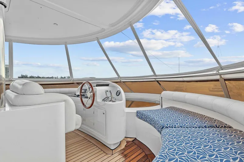 Slide: The Image of Luxurious interior of 2005 New Zealand Yachts 115 Wave Piercer with elegant seating and helm. - 24