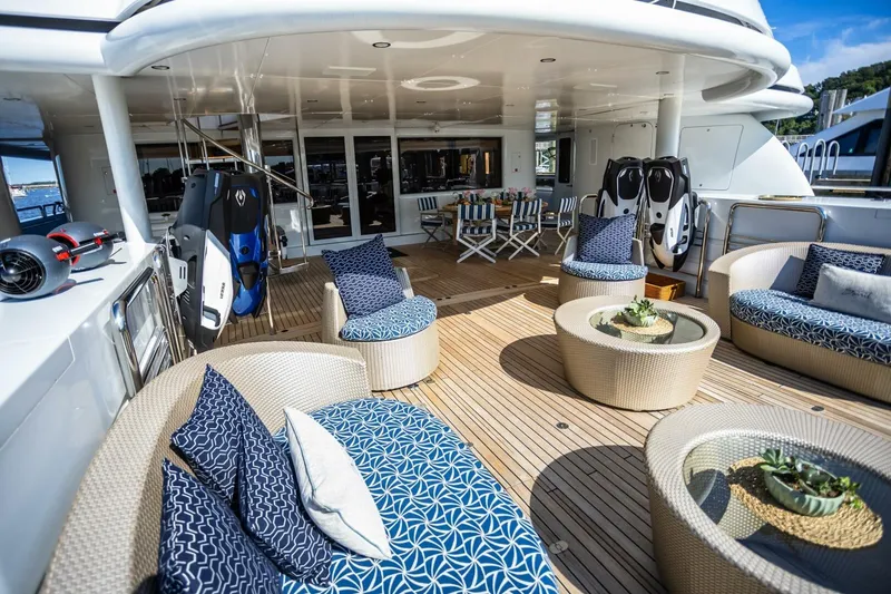 Slide: The Image of Luxurious 2005 New Zealand Yachts 115 Wave Piercer deck with elegant seating and decor. - 28