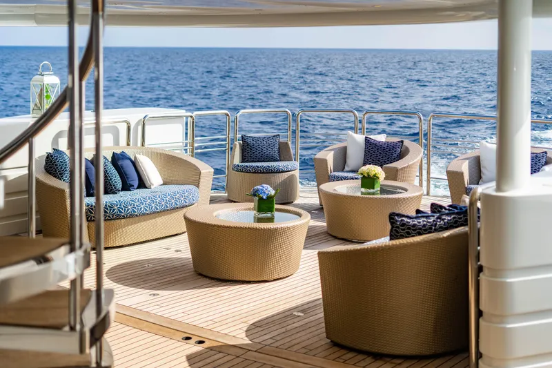 Slide: The Image of Luxurious deck seating on 2005 New Zealand Yachts 115 Wave Piercer, overlooking the ocean. - 29