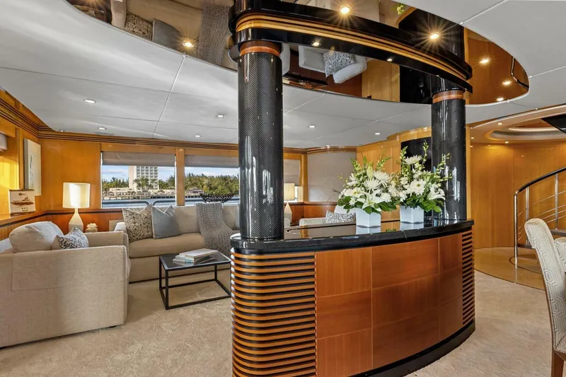 Slide: The Image of Luxurious interior of 2005 New Zealand Yachts 115 Wave Piercer with elegant seating and floral decor. - 36