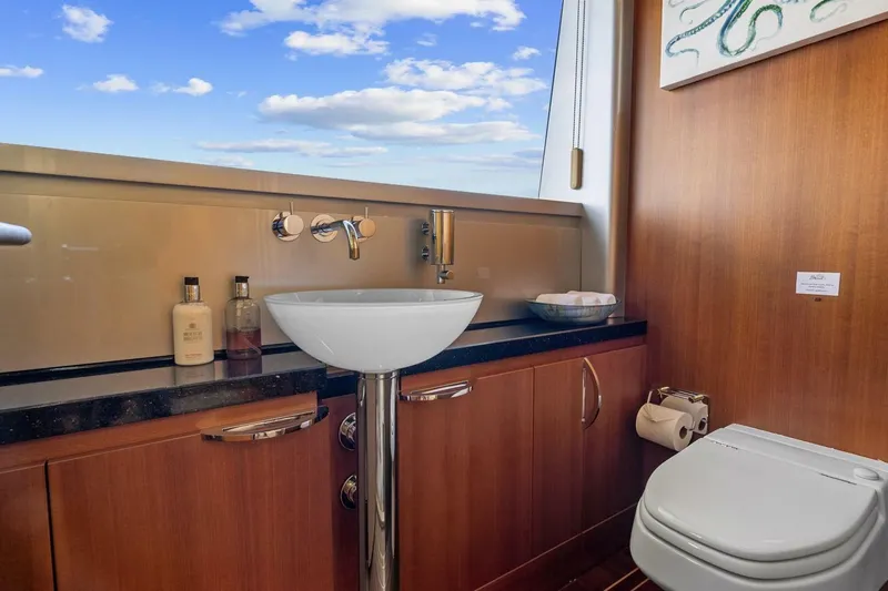 Slide: The Image of Luxurious bathroom on 2005 New Zealand Yachts 115 Wave Piercer, featuring modern fixtures and ocean view. - 41