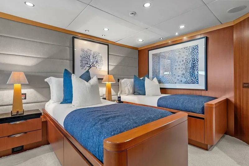 Slide: The Image of Luxurious twin bedroom on 2005 New Zealand Yachts 115 Wave Piercer, featuring elegant decor. - 50