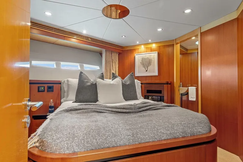 Slide: The Image of Luxurious cabin interior of 2005 New Zealand Yachts 115 Wave Piercer, featuring elegant wood finishes. - 51