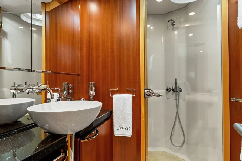 Slide: The Image of Luxurious yacht bathroom with modern sink and shower, New Zealand Yachts 115 Wave Piercer, 2005. - 52