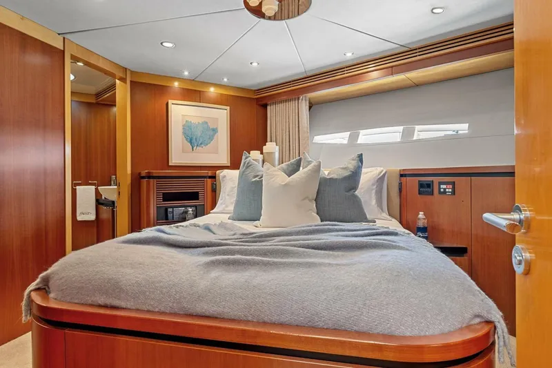 Slide: The Image of Luxurious bedroom interior of 2005 New Zealand Yachts 115 Wave Piercer. - 54