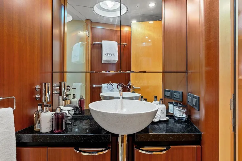 Slide: The Image of Luxurious bathroom on 2005 New Zealand Yachts 115 Wave Piercer, featuring elegant sink and amenities. - 55