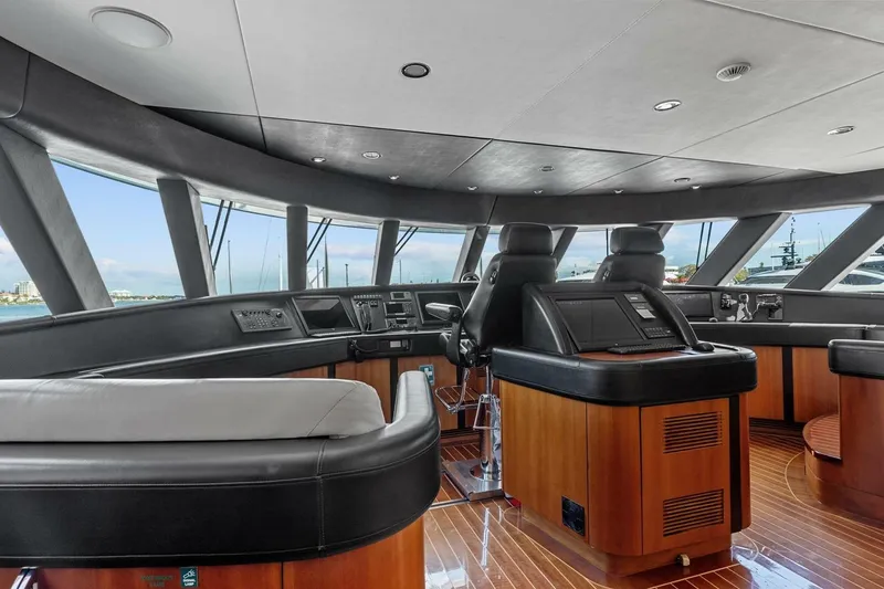 Slide: The Image of Luxurious interior of 2005 New Zealand Yachts 115 Wave Piercer, featuring sleek helm and panoramic windows. - 62