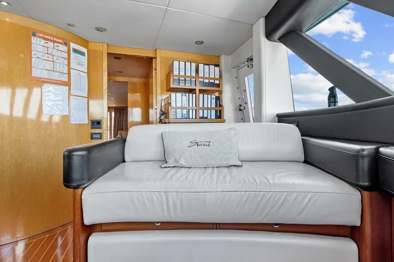 Slide: The Image of Luxurious interior of 2005 New Zealand Yachts 115 Wave Piercer with plush seating and wooden accents. - 65