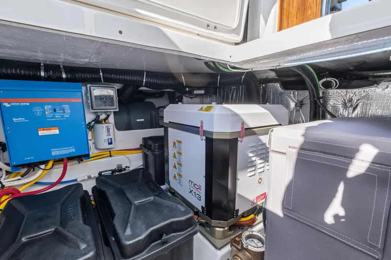 Slide: The Image of Engine room of 2026 MJM 47 R yacht with electrical equipment and wiring. - 44