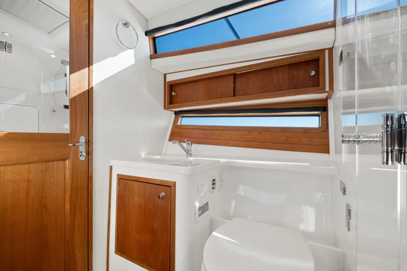 Slide: The Image of Luxurious bathroom interior of 2026 MJM 47 R yacht with wooden accents. - 21