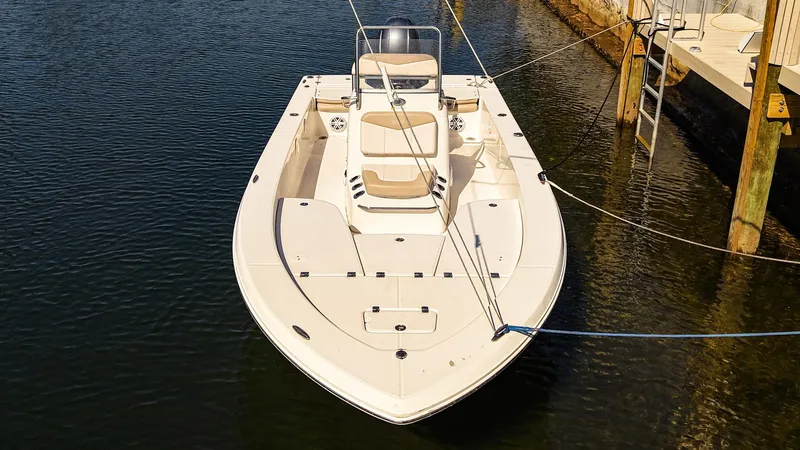 Slide: The Image of 2016 Robalo 206 Cayman boat docked on calm water, viewed from above. - 18