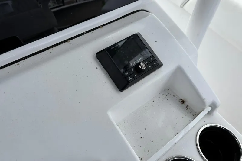 Slide: The Image of Control panel on 2021 Sportsman Open 252 Center Console boat dashboard. - 15