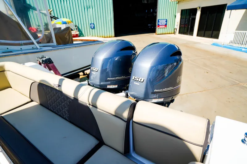 Slide: The Image of 2021 Tidewater 256 LXF boat with twin Yamaha 150 outboard engines. - 4
