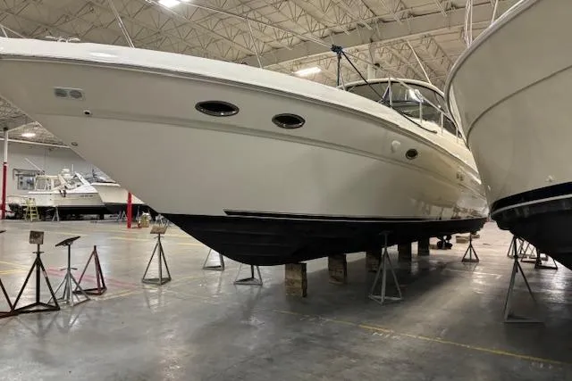 Slide: The Image of 2001 Sea Ray 460 Sundancer yacht in indoor storage facility. - 5