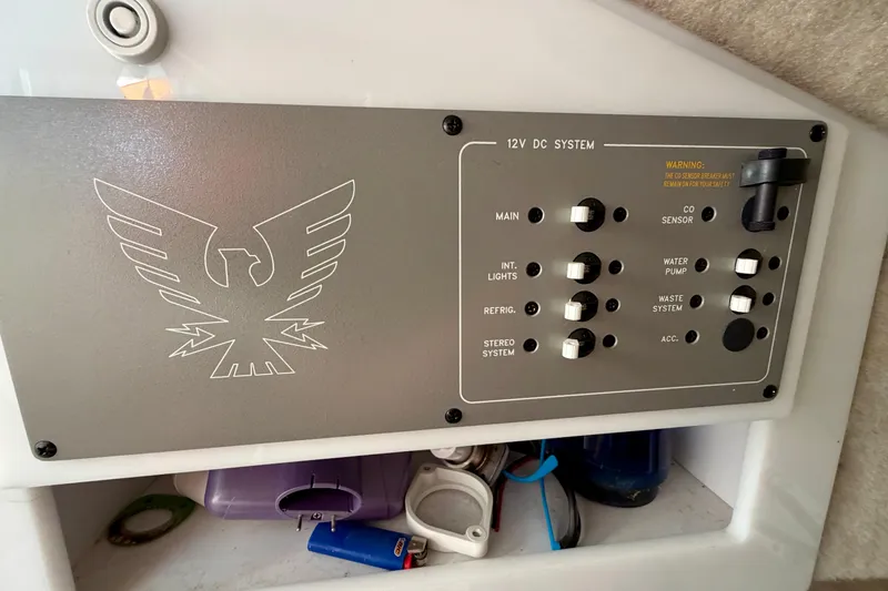 Slide: The Image of Control panel of a 2000 Formula 280 Bowrider boat's 12V DC system. - 23