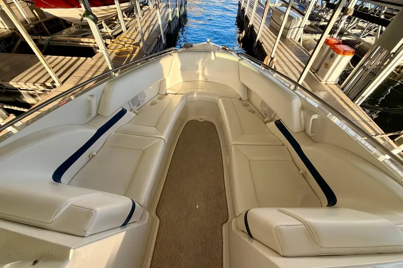 Slide: The Image of 2000 Formula 280 Bowrider boat interior with spacious seating and elegant design. - 25