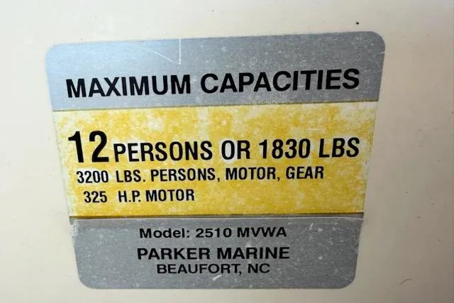 Slide: The Image of Capacity label for Parker 2510 Walkaround, 2001: 12 persons or 1830 lbs, 325 HP motor. - 37