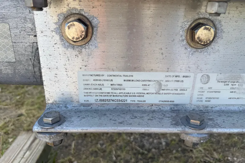 Slide: The Image of Close-up of a Continental Trailers label with specifications and VIN details. - 47