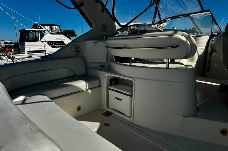 Slide: The Image of 2004 Regal Commodore 3860 yacht interior with seating and storage. - 20