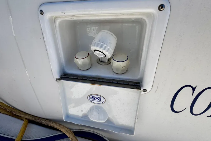 Slide: The Image of Exterior shower controls on a 2004 Regal Commodore 3860 boat. - 23