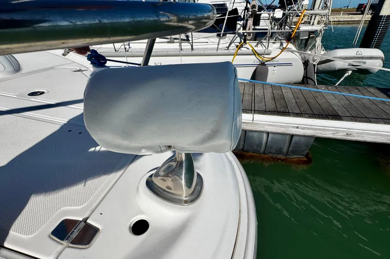 Slide: The Image of 2004 Regal Commodore 3860 spotlight on deck near marina dock. - 30