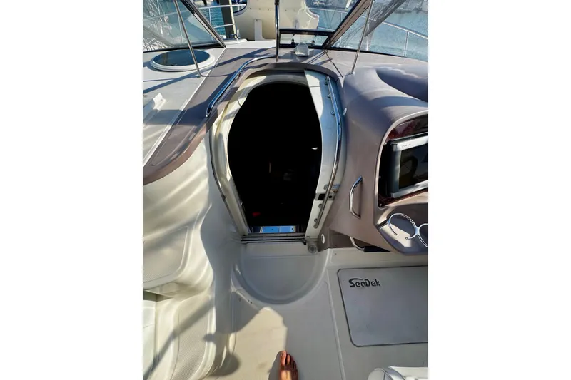 Slide: The Image of 2004 Regal Commodore 3860 yacht cockpit entrance with SeaDek flooring. - 33
