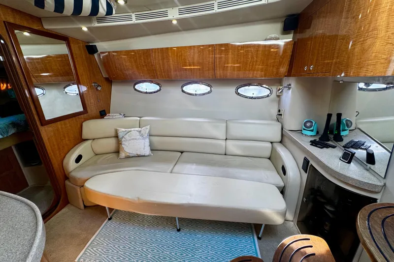 Slide: The Image of Luxurious interior of 2004 Regal Commodore 3860 yacht with leather seating and modern amenities. - 38