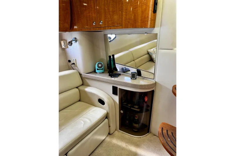 Slide: The Image of Luxurious interior of 2004 Regal Commodore 3860 yacht with seating and storage. - 40