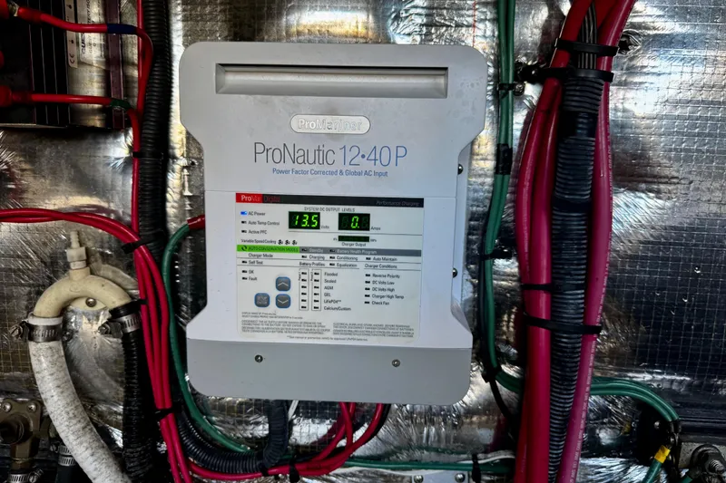 Slide: The Image of ProNautic 12-40P charger in 2004 Regal Commodore 3860 engine room with cables. - 71