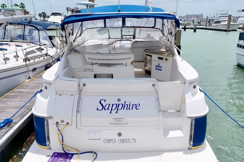 Slide: The Image of 2004 Regal Commodore 3860 yacht named "Sapphire" docked in Corpus Christi, TX marina. - 8