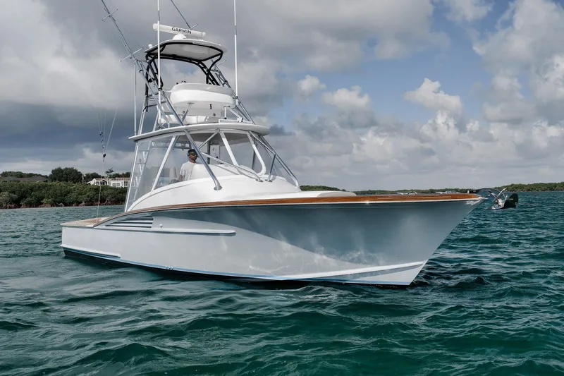 The Image of 2022 Winter Custom Yachts 38 Walk Around on open water under cloudy sky. - 0