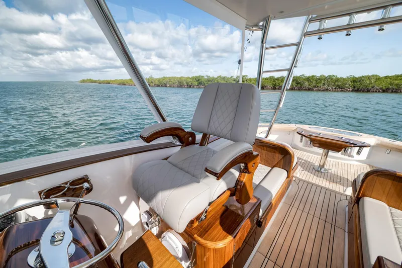 Slide: The Image of Luxurious interior of 2022 Winter Custom Yachts 38 Walk Around on serene water. - 22