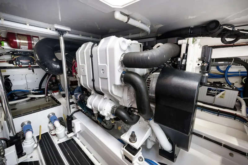 Slide: The Image of Engine room of 2022 Winter Custom Yachts 38 Walk Around, showcasing advanced marine engineering. - 28