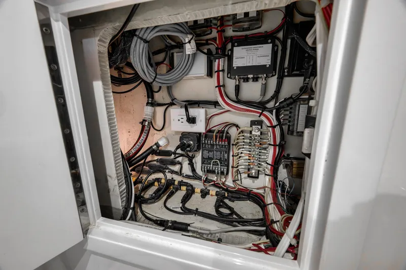 Slide: The Image of Electrical wiring and components inside a 2022 Winter Custom Yachts 38 Walk Around boat. - 34