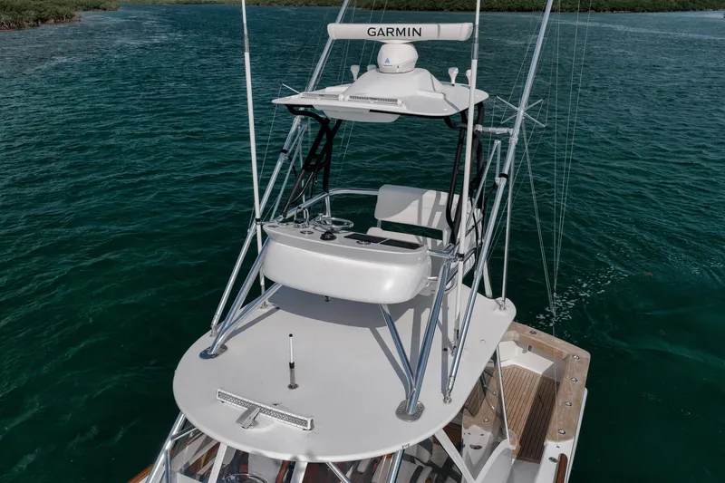 Slide: The Image of 2022 Winter Custom Yachts 38 Walk Around on water, featuring Garmin equipment. - 8